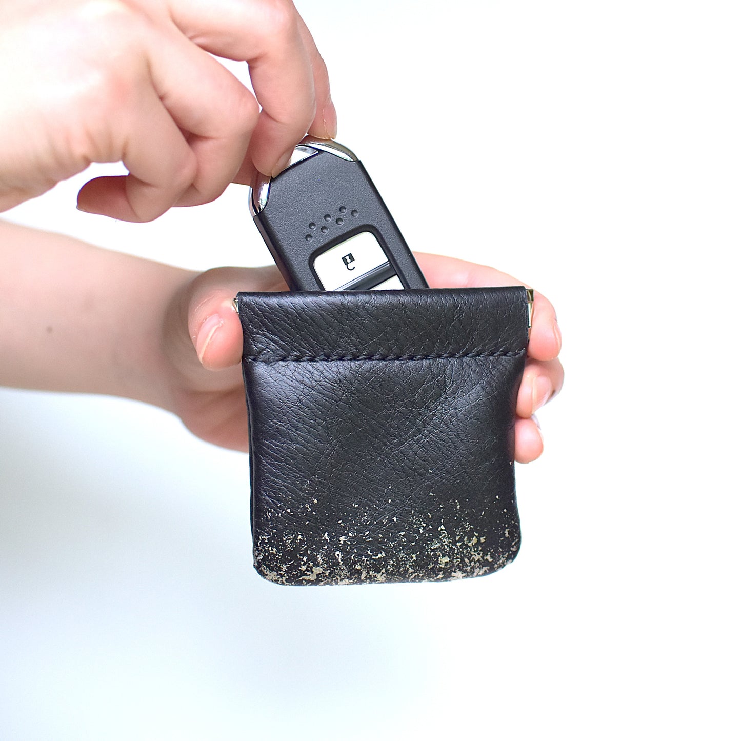 Leather and lacquer coin case Asaka