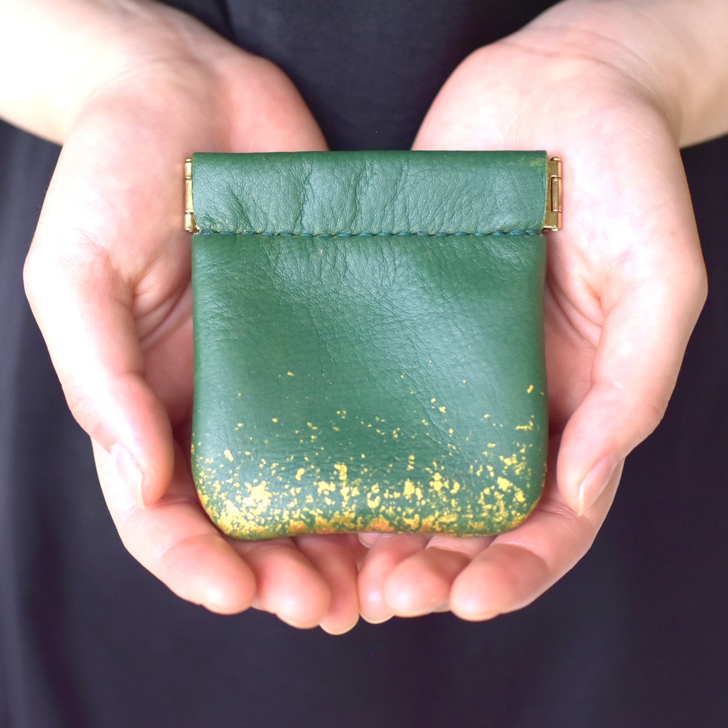 Leather and lacquer coin case